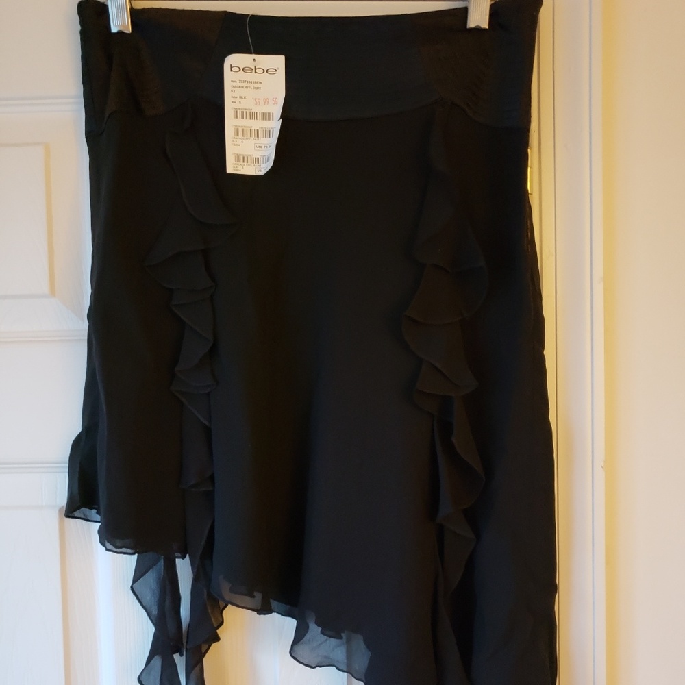 Black ruffle mini skirt